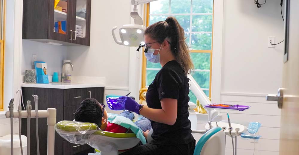 Child Receiving Dental Hygiene Visit