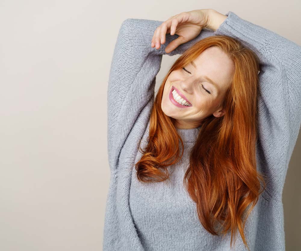 Woman with Beautiful Teeth from Porcelain Veneers